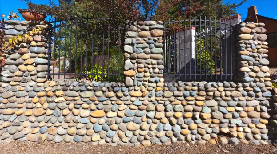 Stone Wall with Iron Fence